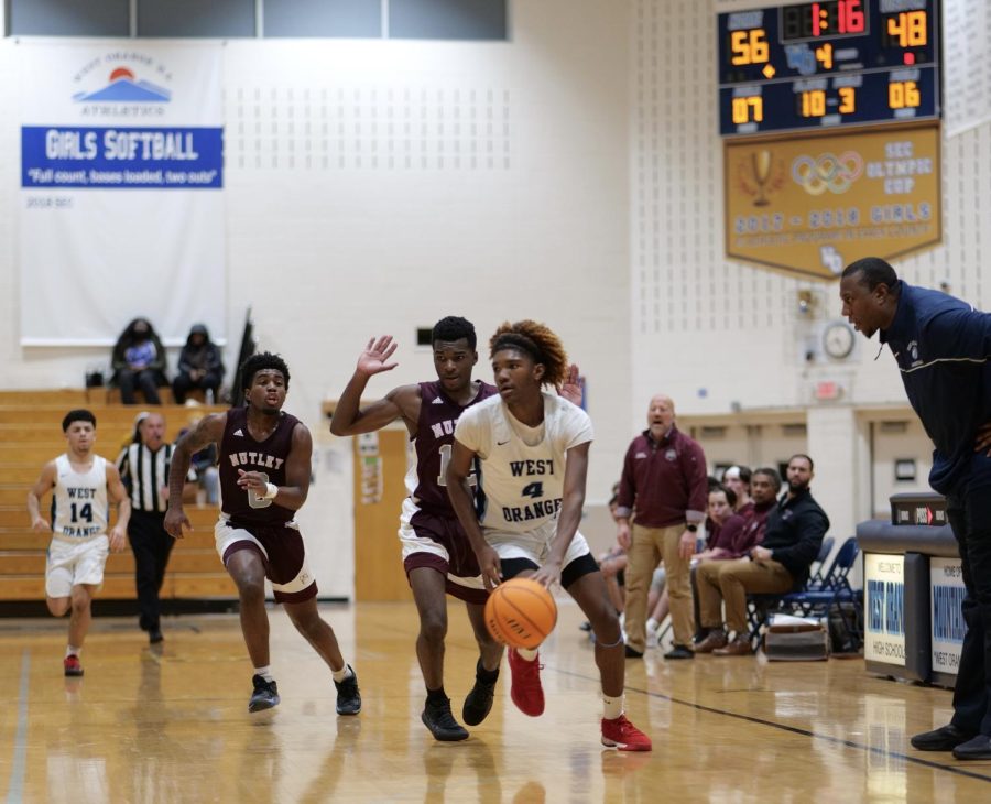 Boys basketball cruises past Nutley in home opener