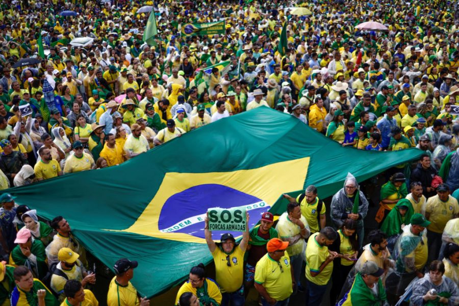People gather during a protest held by supporters of Brazils President Jair Bolsonaro against President-elect Luiz Inacio Lula da Silva, who won a third term following the presidential election run-off, at the Army Headquarters in Brasilia, Brazil, November 15, 2022. REUTERS/Ueslei Marcelino