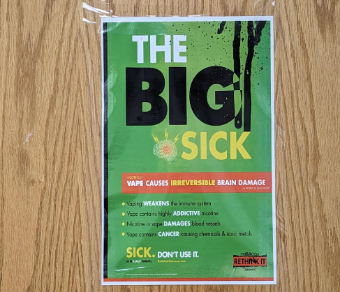 The Big Sick vaping awareness poster taped outside of a girls bathroom at WOHS